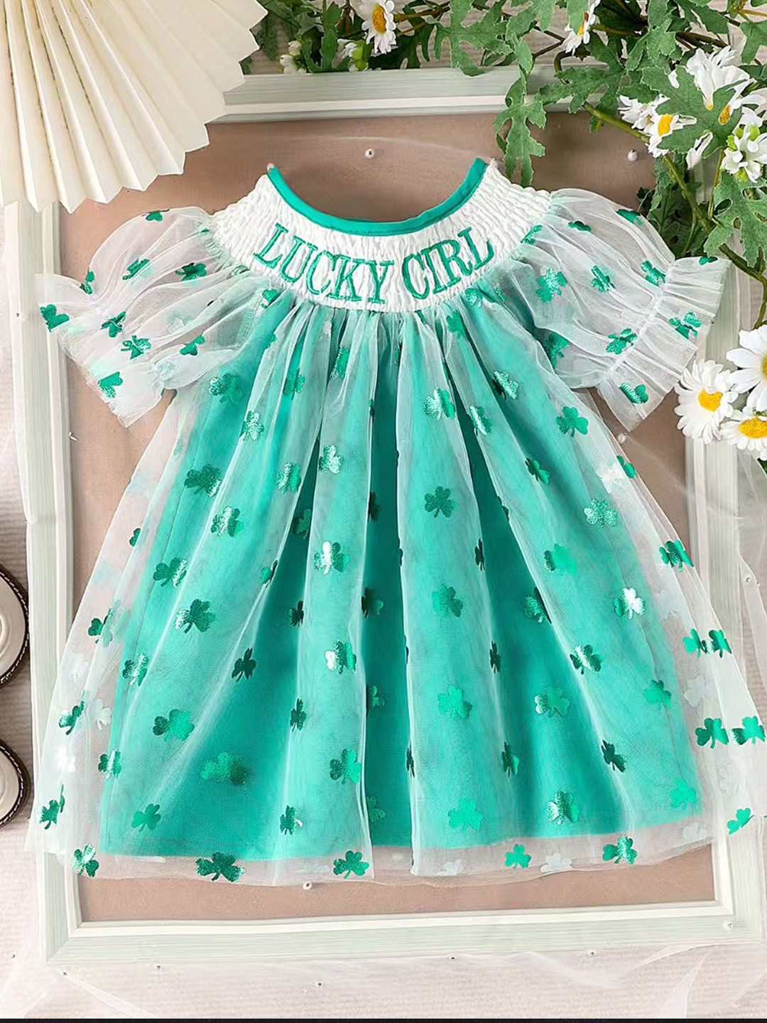 

Xsole Girls Graphic Printed Fit & Flare Round Neck Knee Length Dress, Green