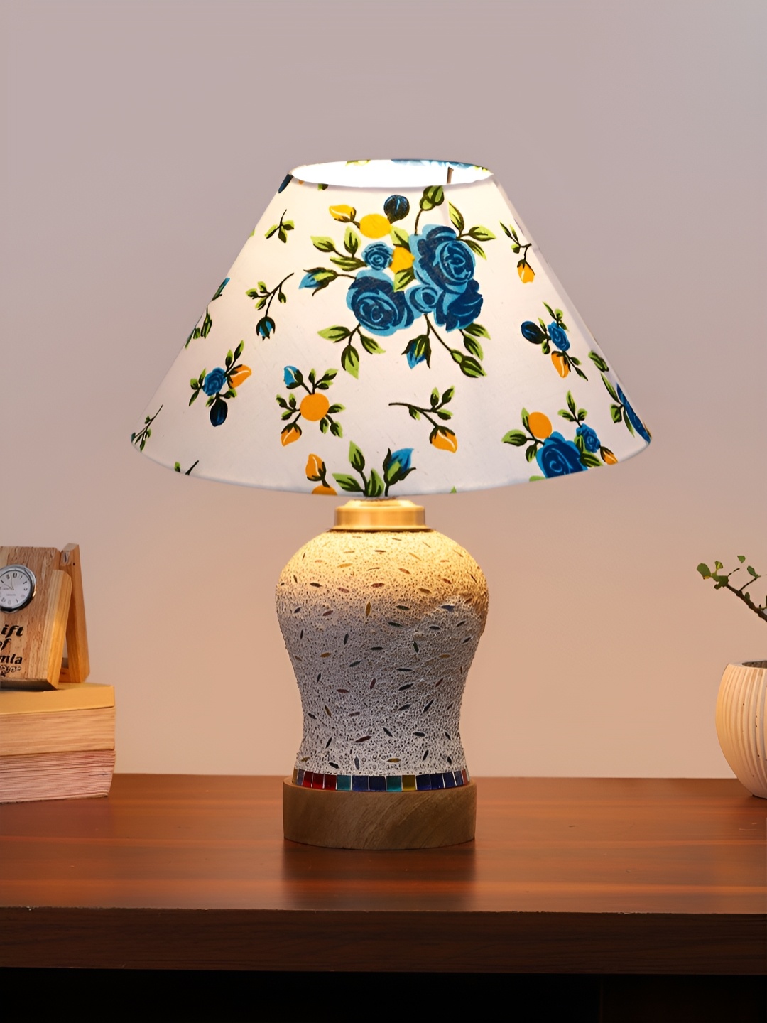 

Devansh White Floral Printed Wooden Frustum Shaped Table Lamp With Mosaic Glass Base