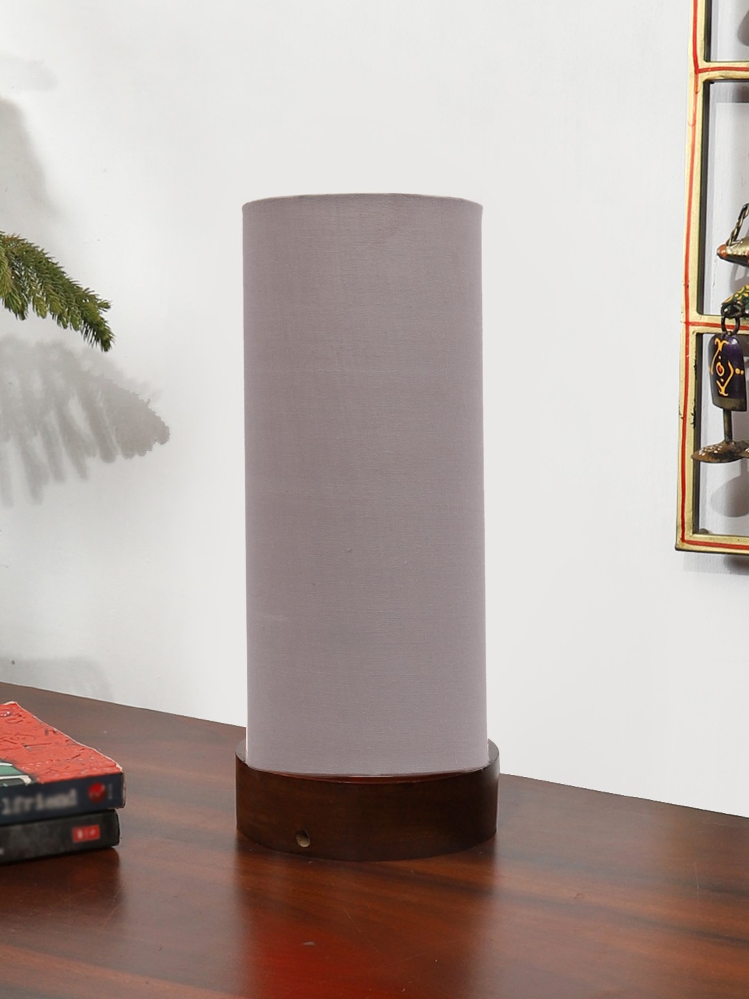 

Devansh Grey Textured Wooden Cylindrical Shaped Table Lamp