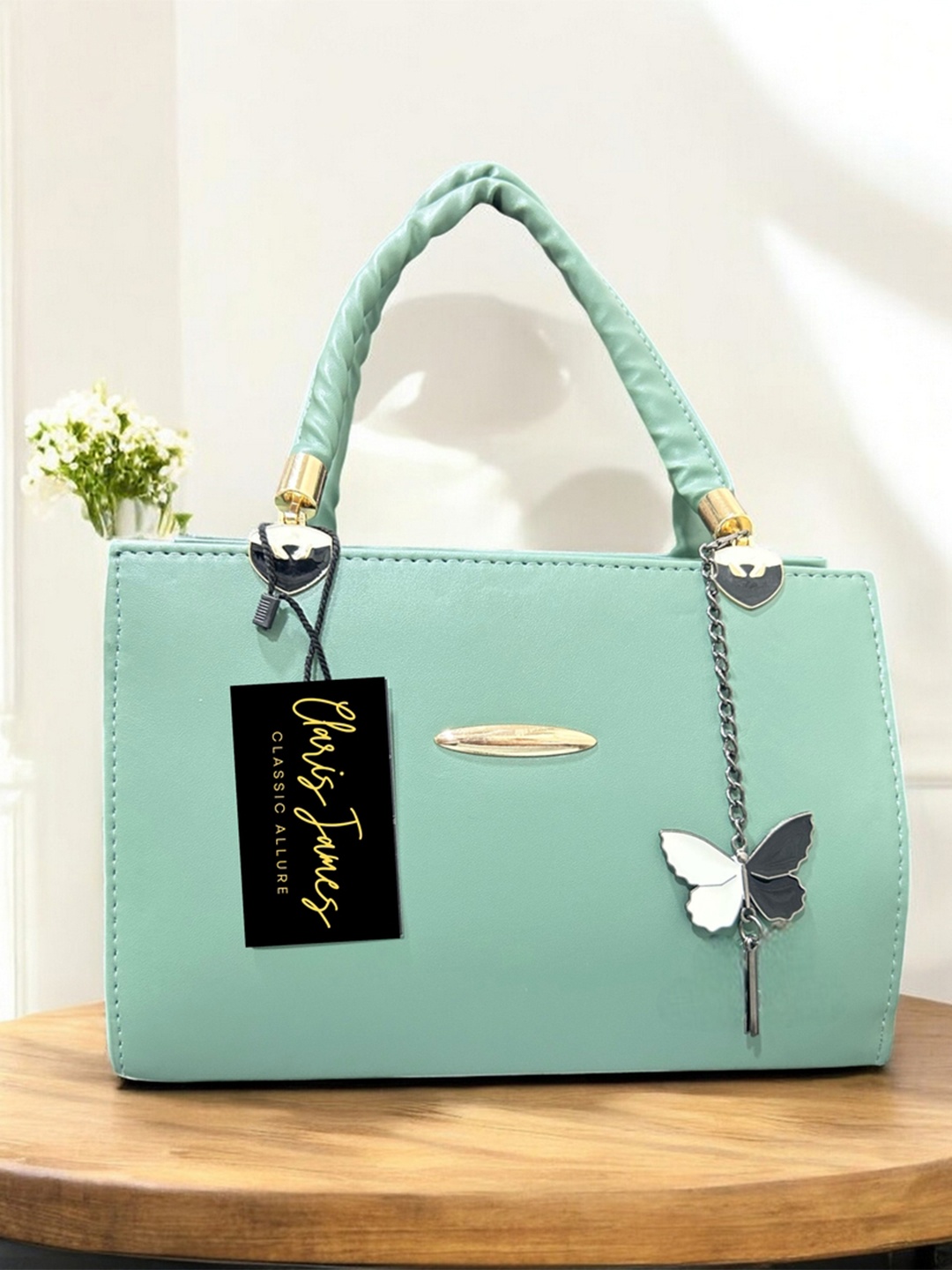 

CLARIS JAMES Women Solid Structured Handheld Bag, Green