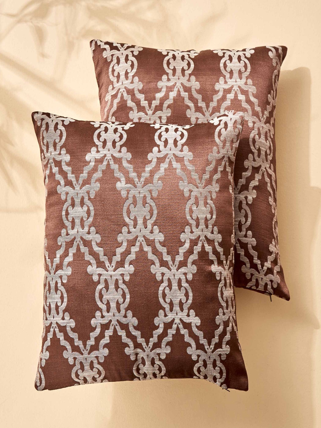 

Home Centre Brown & White 2 Pieces Geometric Square Cushion Covers