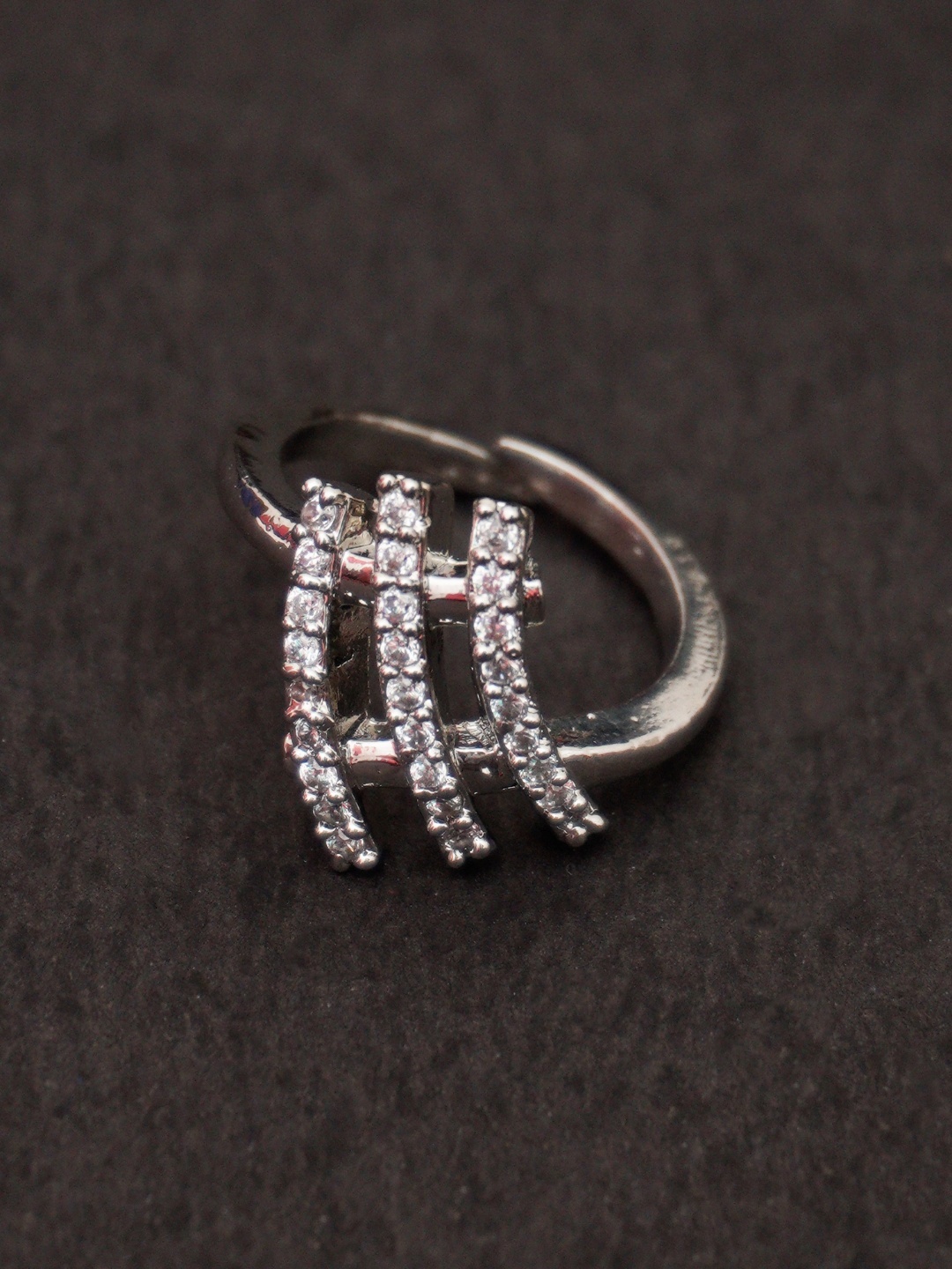 

Niscka Rhodium-Plated American Diamond Studded Adjustable Finger Ring, Silver