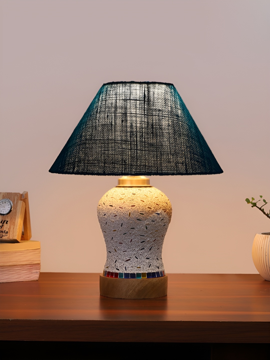 

Devansh Turquoise Blue & White Printed Frustum Shaped Wooden Table Lamp