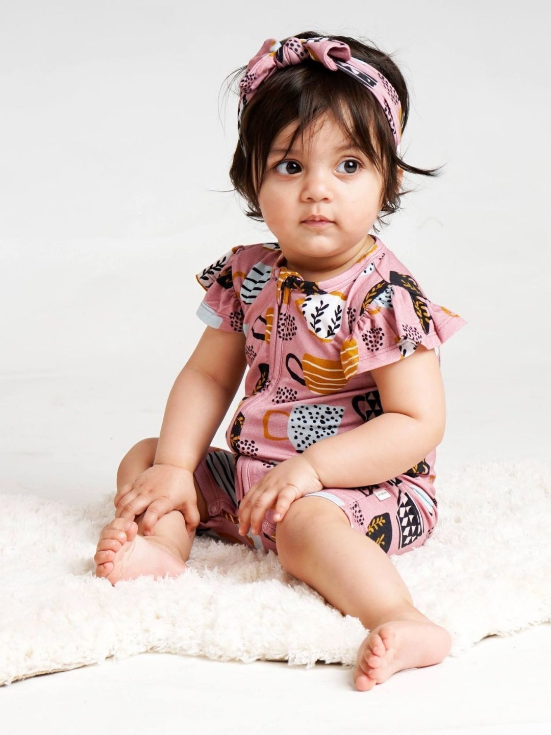 

THE PLUSH CLUB Infants Cups Printed Round Neck Rompers, Pink