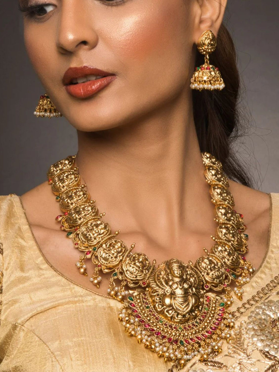 

QUEENS JEWELS Gold-Plated Artificial Stones-Studded & Beaded Jewellery Set