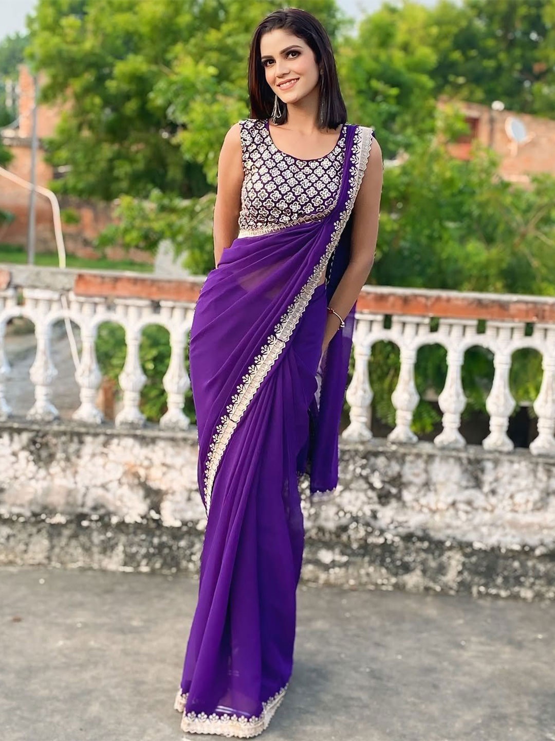 

Moda Rapido Embroidered Pure Georgette Saree, Purple