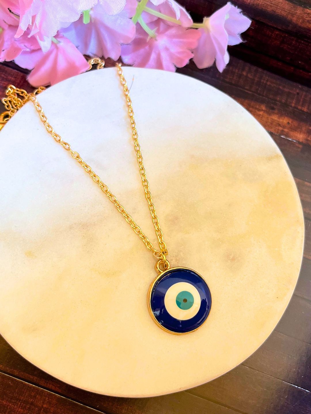 

DressBerry Gold-Plated Circular Shaped Evil Eye Pendant With Chain