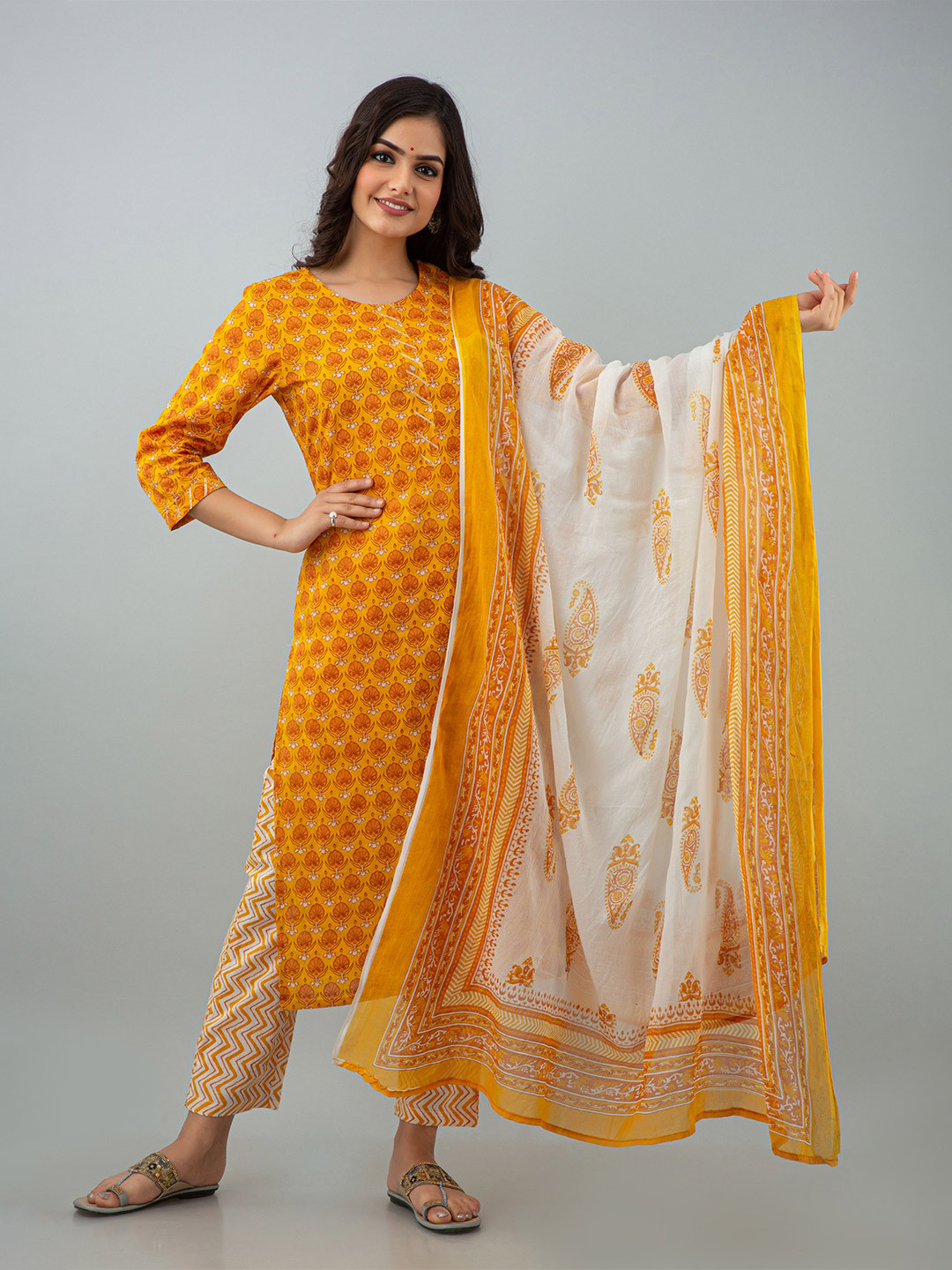 

Prathmikta Floral Printed Pure Cotton Straight Kurta With Trousers And Dupatta, Yellow