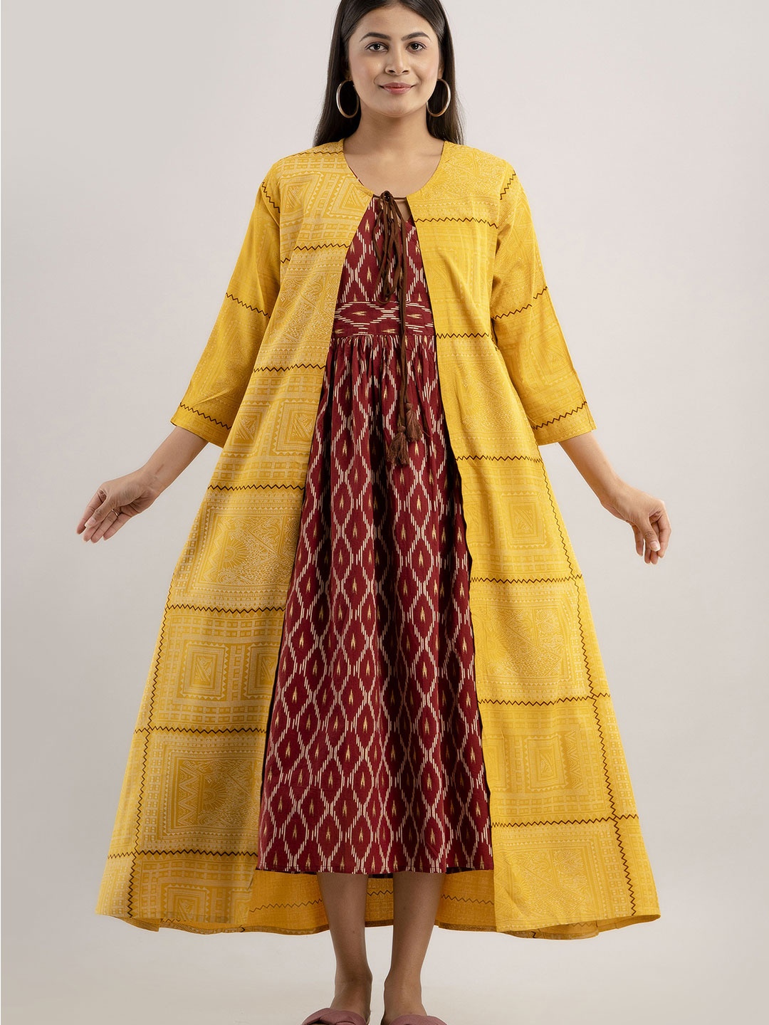 

Jaipurite Ethnic Motifs Printed V Neck A-Line Ethnic Dress, Maroon