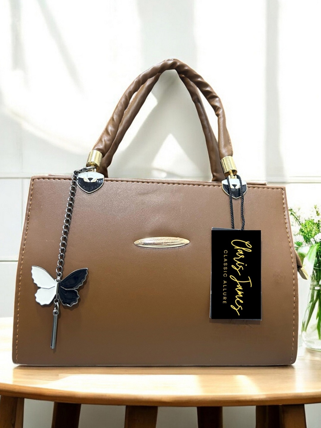 

CLARIS JAMES Women Solid Structured Handheld Bag, Brown