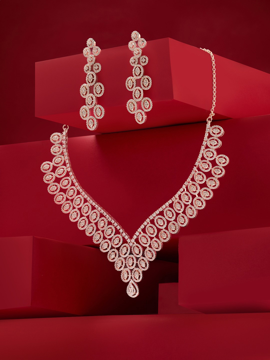 

Zaveri Pearls Rose-Gold Plated Cubic Zirconia Stones Studded Jewellery Set