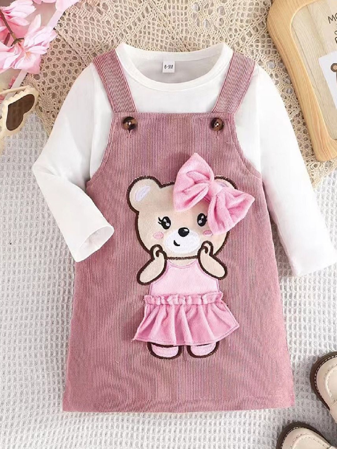 

Xsole Girls Graphic Self Design Pinafore Knee Length Dress, Pink