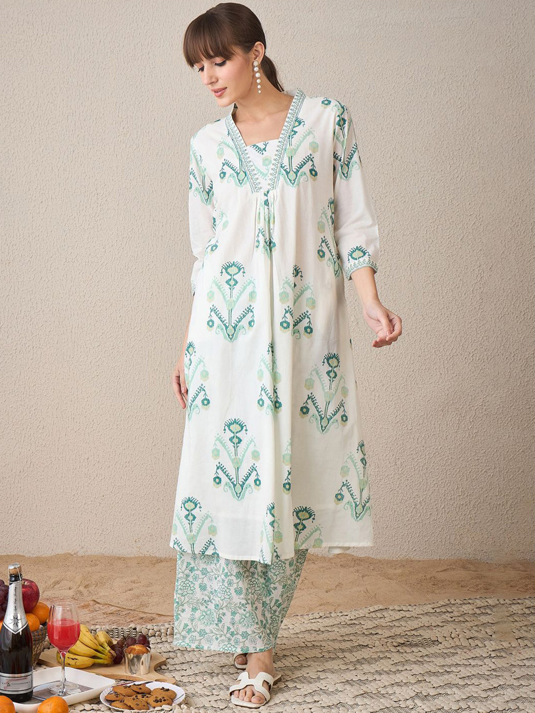 

Indo Era Women Floral Printed Regular Sequinned Pure Cotton Kurta with Palazzos, White