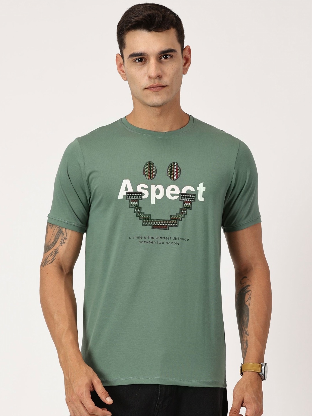

RAVINIK Men Typography Printed Round Neck Cotton T-shirt, Green