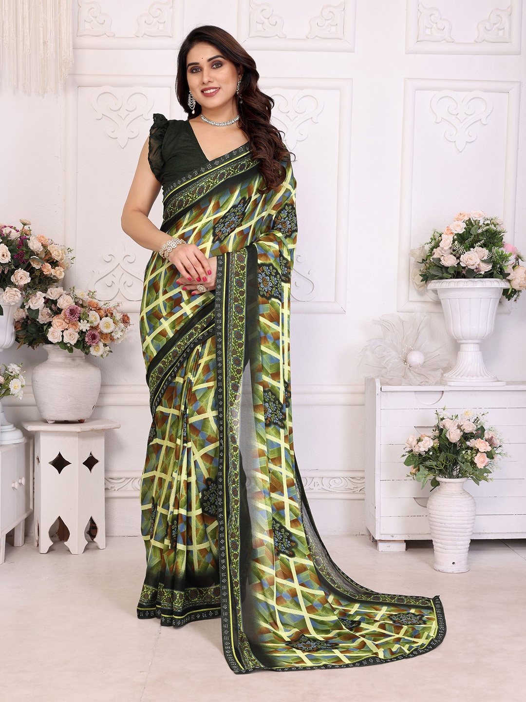 

Nirmohi Fashion Ethnic Motifs Printed Saree, Green