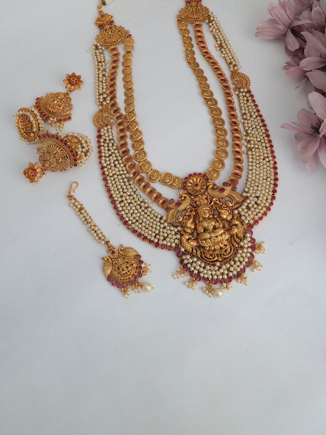 

Chaandi Rivaaz Gold-Plated Stone-Studded & Pearl Beaded Antique Jewellery Set