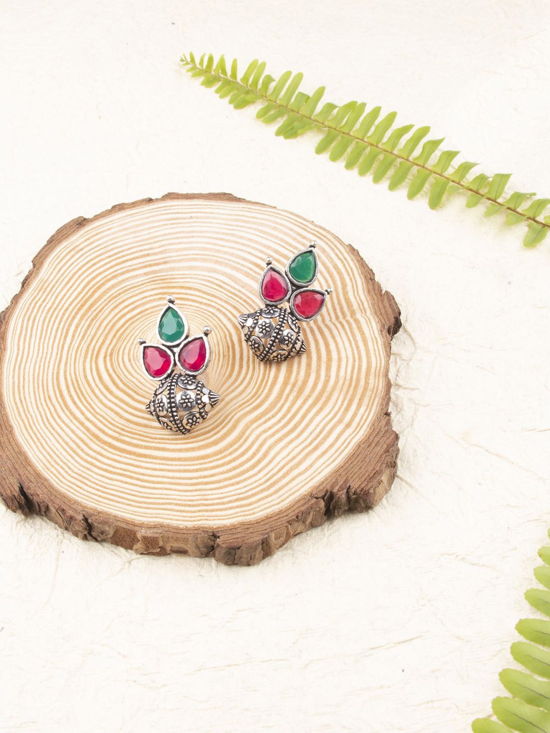 

Sangria Silver-Plated Artificial Stones Studded Floral Oxidised Studs