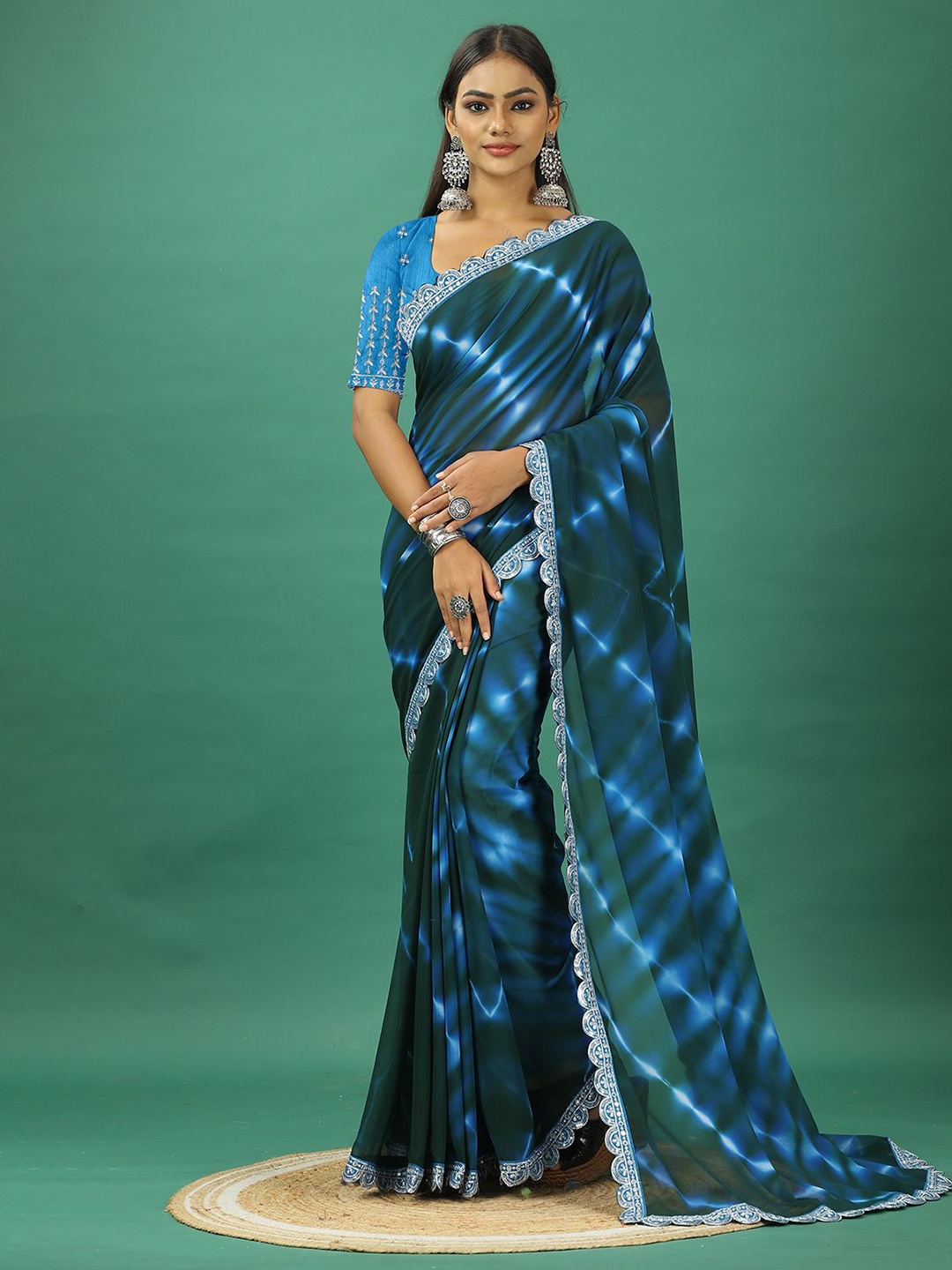 

VIRENDRA TEXTILES Tie and Dye Embroidered Pure Georgette Saree, Turquoise blue