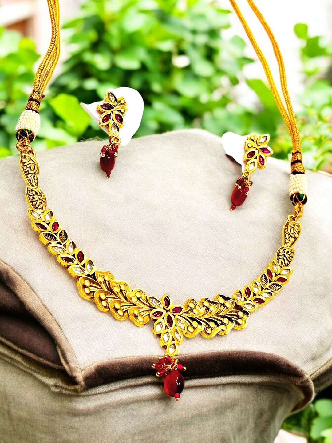 

Chaandi Rivaaz Gold-Plated Kundan-Studded & Pearl Beaded Antique Jewellery Set