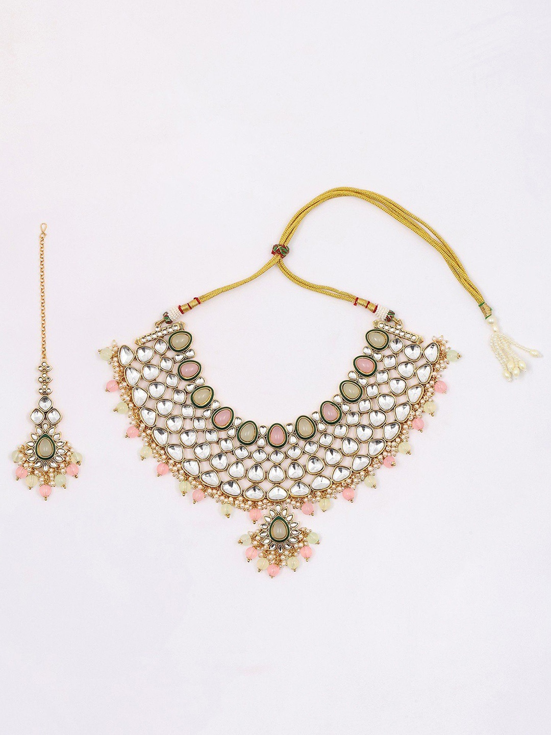 

Exotic India Gold-Plated Kundan Studded Three Layered Necklace With Earrings Set