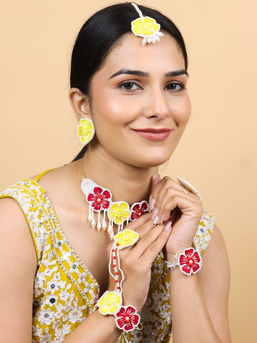 

Sangria Gold-Plated Artificial Beads Beaded Floral Jewellery Set