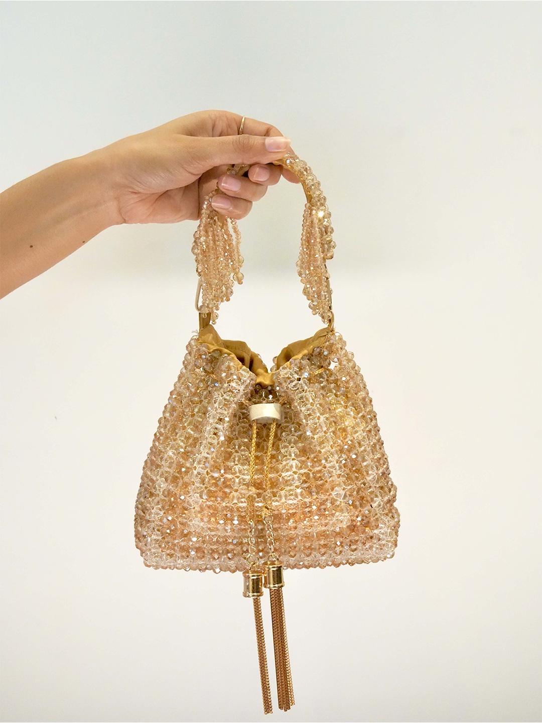 

Chiaro Embellished Beaded Potli Bag, Gold