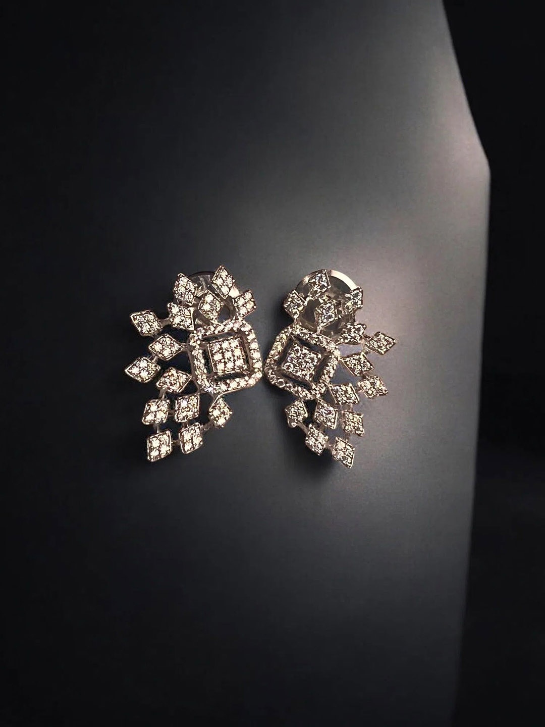 

VOGUE BY RITU Artificial Stones Studded Contemporary Studs, Silver
