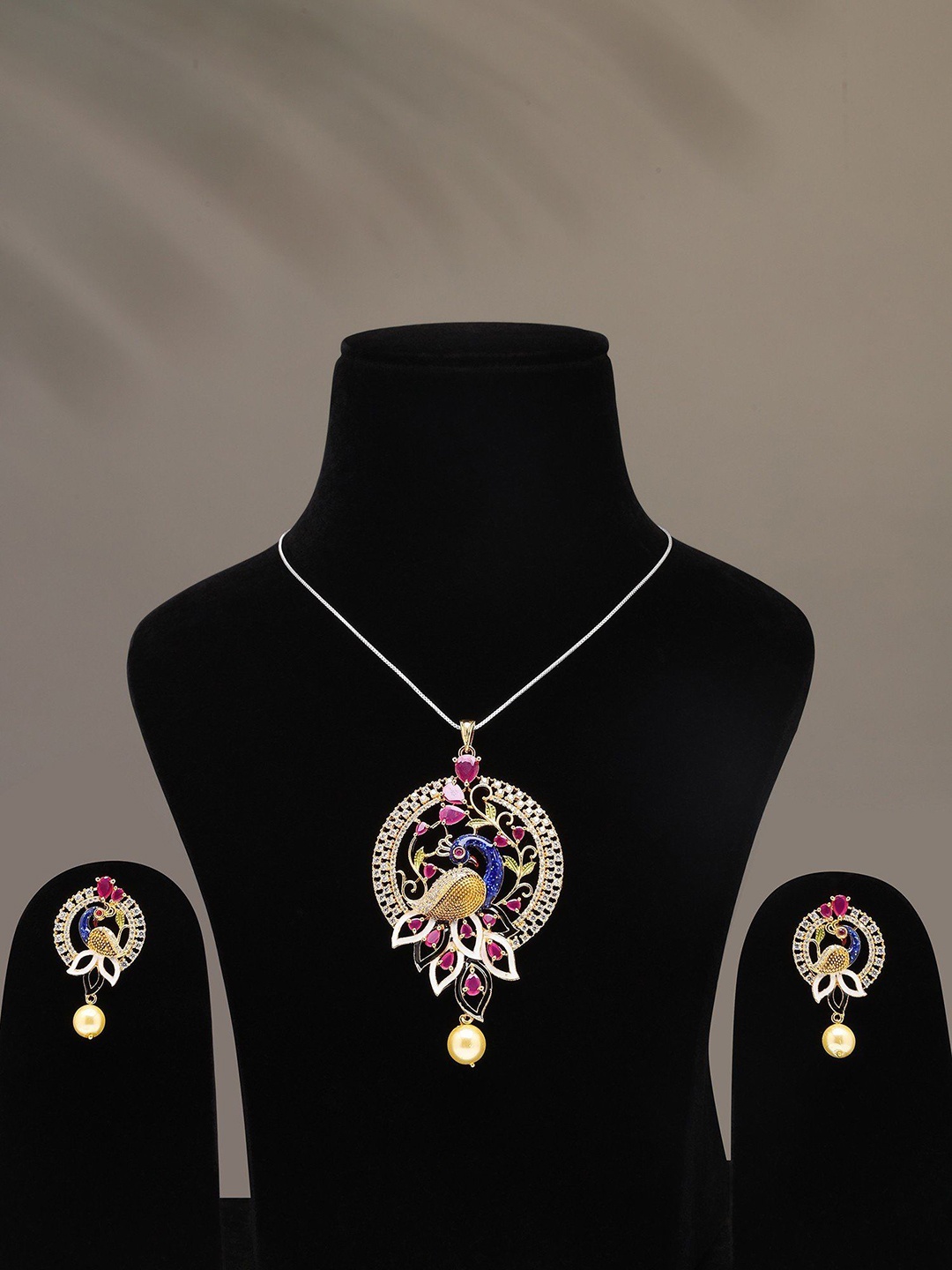 

Exotic India Women Gold-Plated Stone Studded & Beaded Peacock Jewellery Set