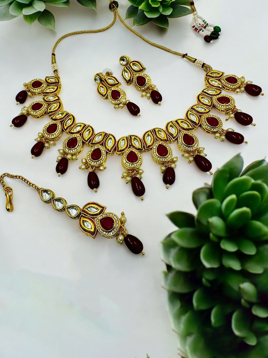 

Chaandi Rivaaz Gold-Plated Kundan-Studded & Beaded Antique Jewellery Set