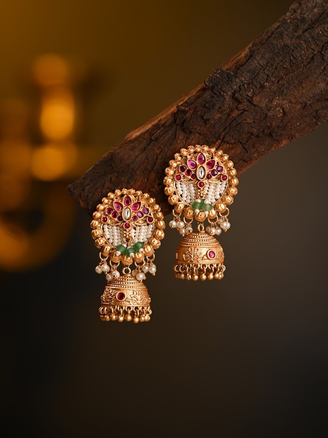 

Anvik Gold-Plated Artificial Stones Studded And Beaded Dome shaped Jhumka
