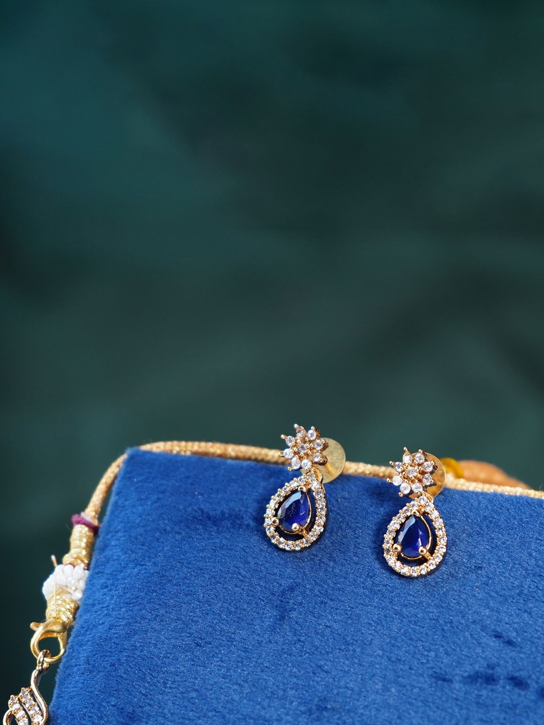 

Chaandi Rivaaz Gold-Plated Cubic Zirconia Stone-Studded Antique Jewellery Set