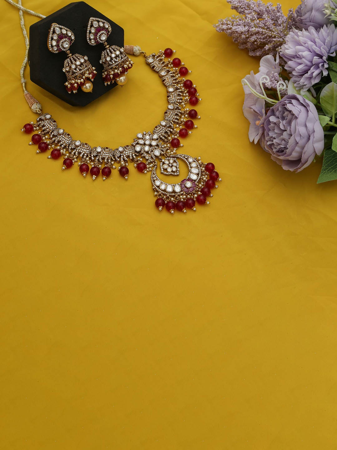 

Chaandi Rivaaz Gold-Plated Kundan Stone-Studded & Pearl Beaded Jewellery Set