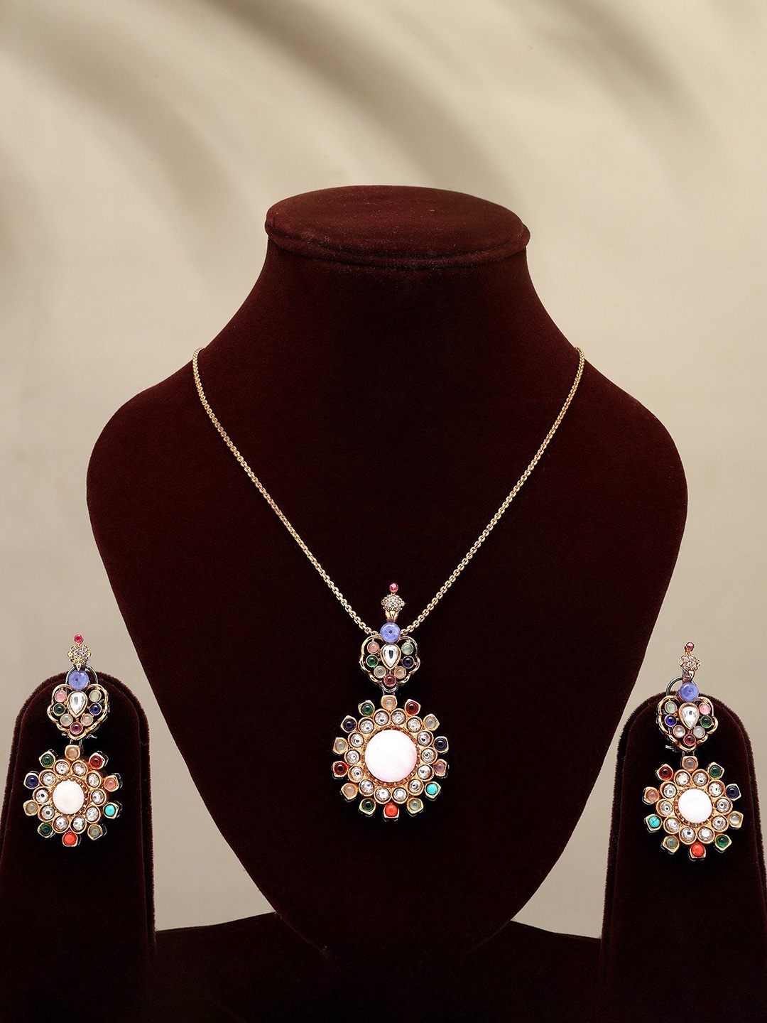 

Exotic India Women Gold-Plated Stone Studded Jewellery Set