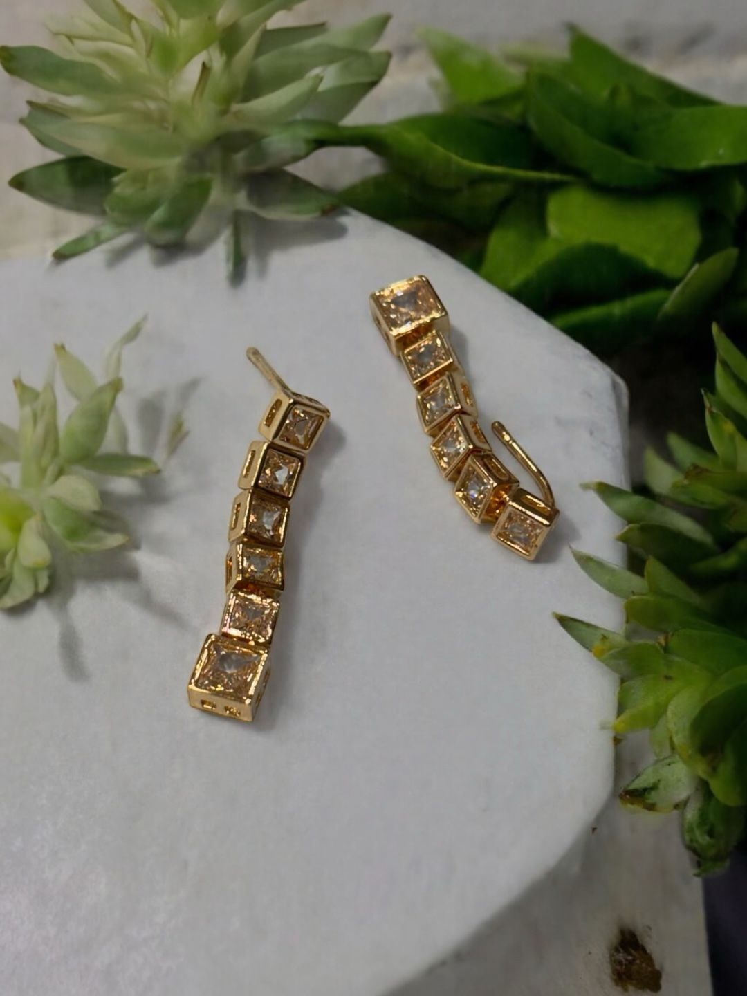 

ADC SHEMONA Sikku Gold-Plated Artificial Stones Studded Contemporary Shaped Drop Earrings