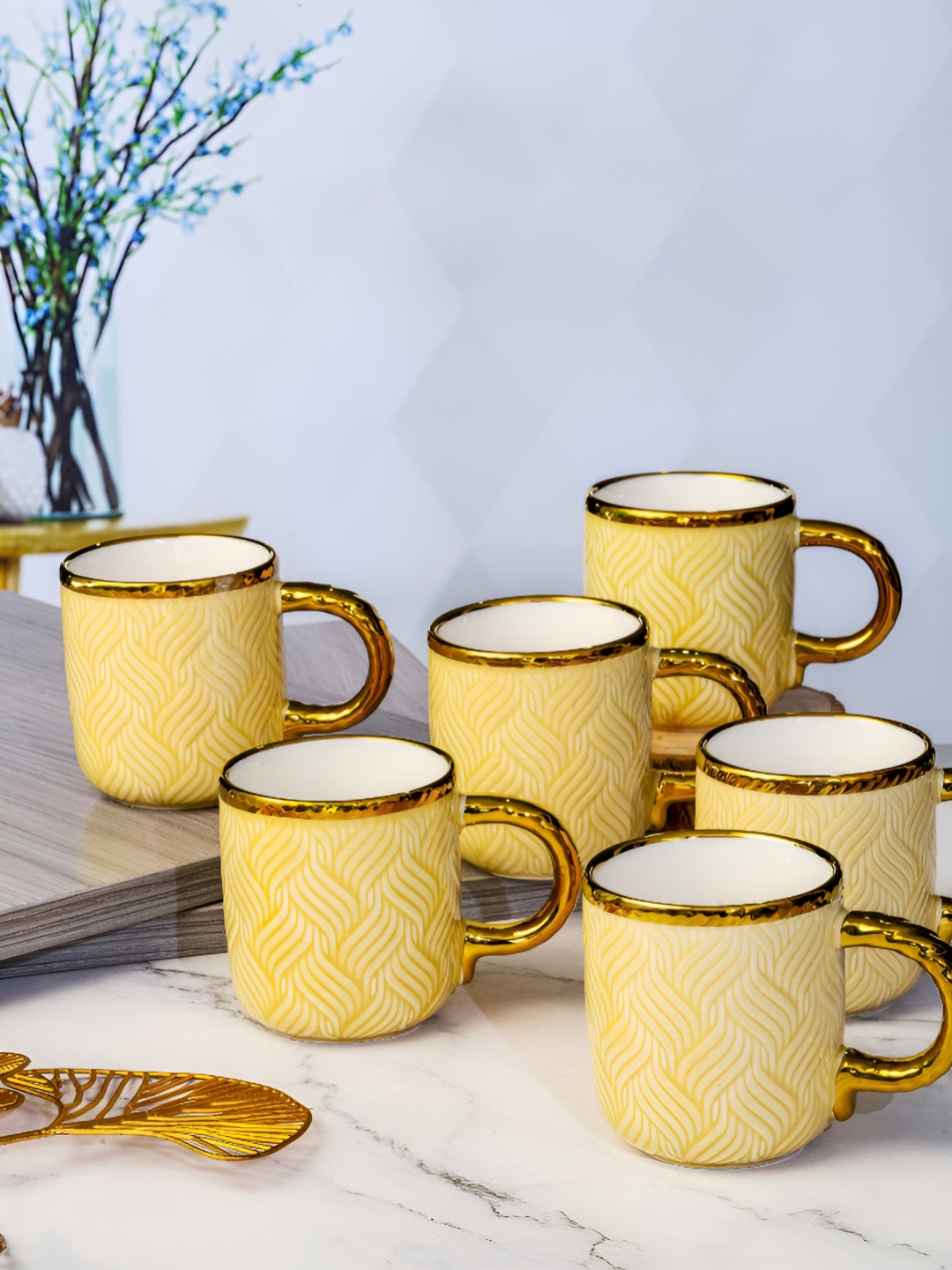 

Roxx Yellow & Gold-Toned Printed 6 Pcs Dishwasher Safe Porcelain Glossy Finish Mugs 180ml