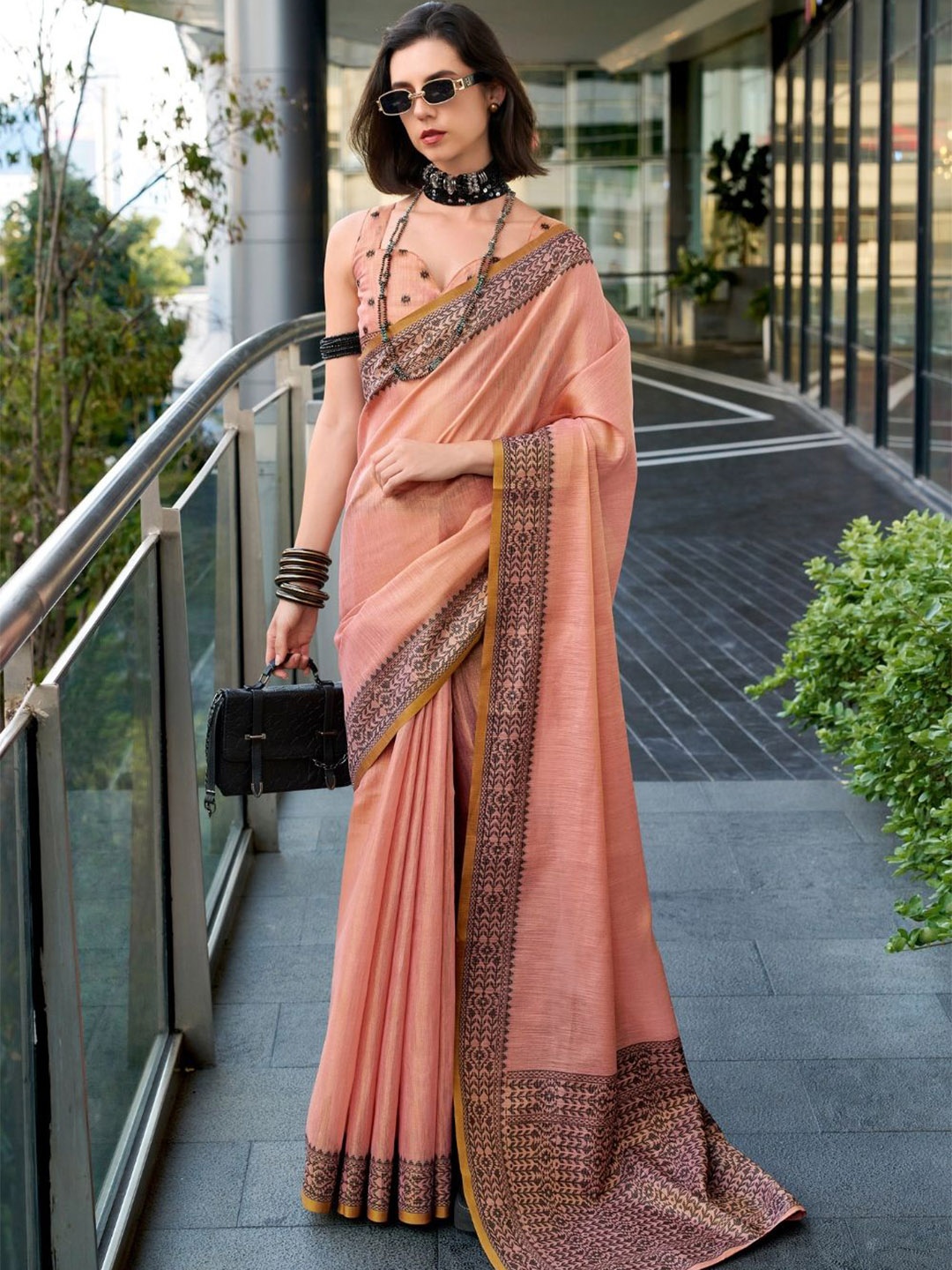 

DEVATITHI Peach Woven Design Tissue Linen Saree With Unstitched Blouse Piece