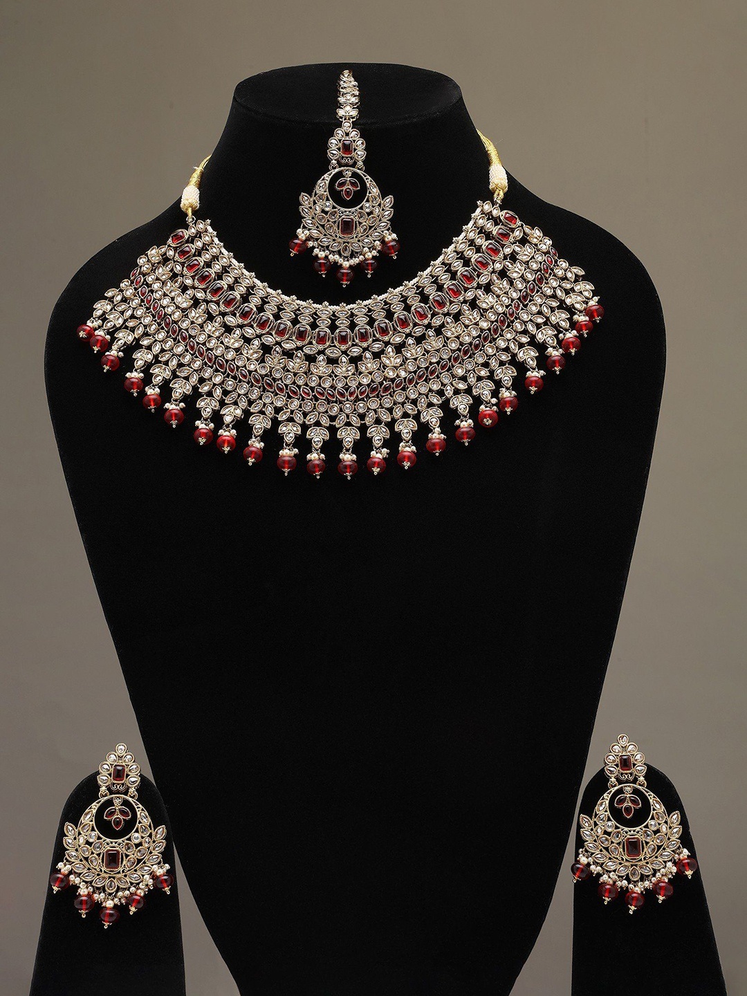 

Exotic India Gold-Plated Stone Studded Choker Necklace Set With Earrings & Mangtika Set