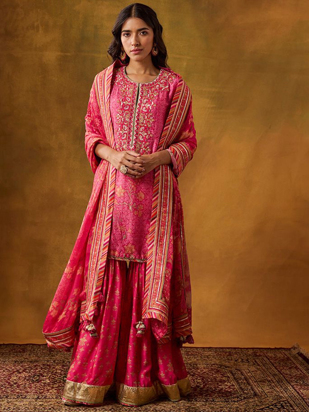 

SAUNDH Women Bandhani Printed Regular Sequinned Raw Silk Kurti with Sharara & With Dupatta, Pink