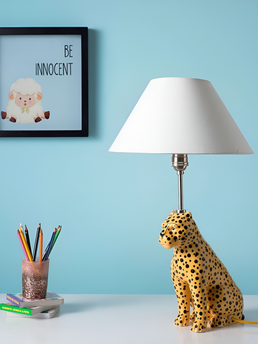 

Pinch of Pretty Yellow & White Leopard Ceramic Frustum Shaped Table Lamp