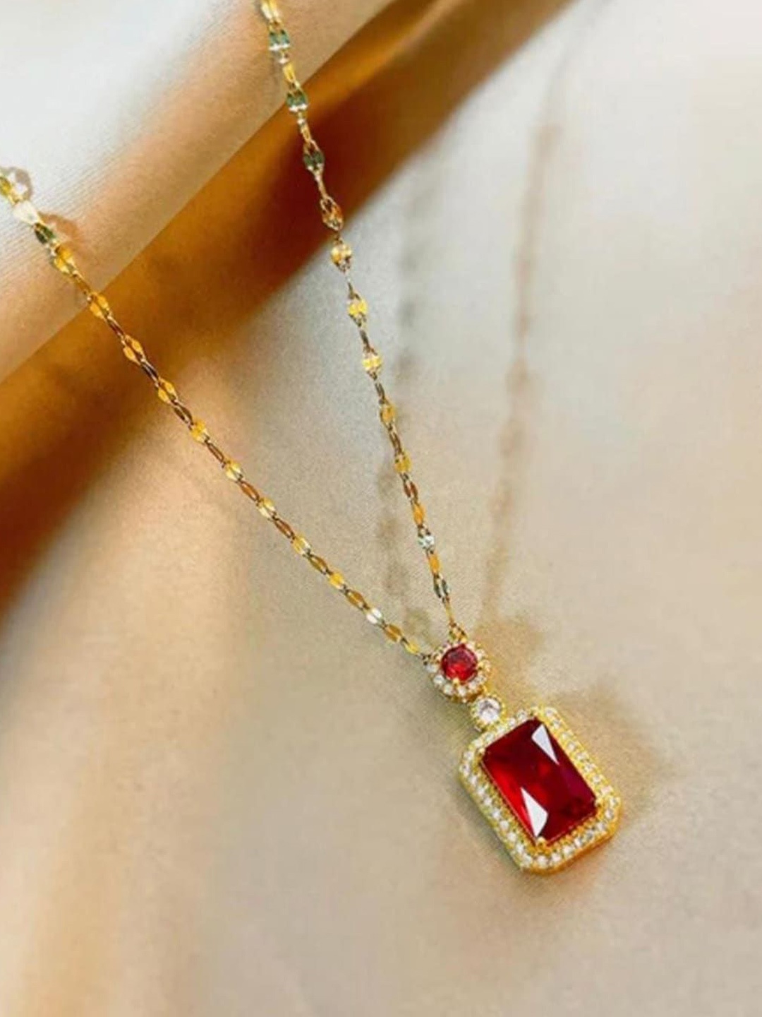 

AGARWALPRODUCT Gold-Plated Artificial Stones Studded Square Shaped Pendants With Chains