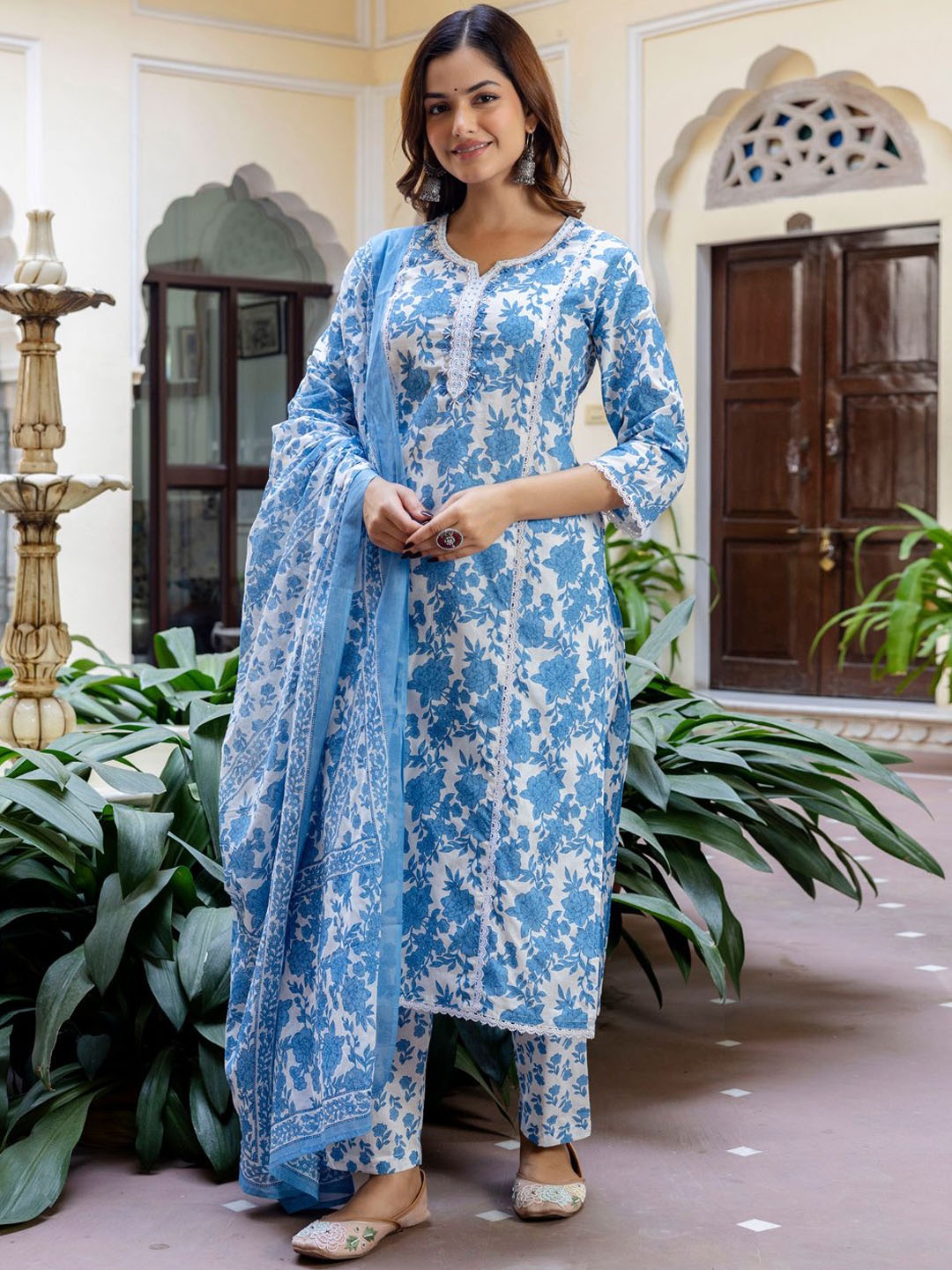 

Indo Era Women Floral Printed Panelled Beads and Stones Pure Cotton Kurta with Trousers & With Dupatta, Blue