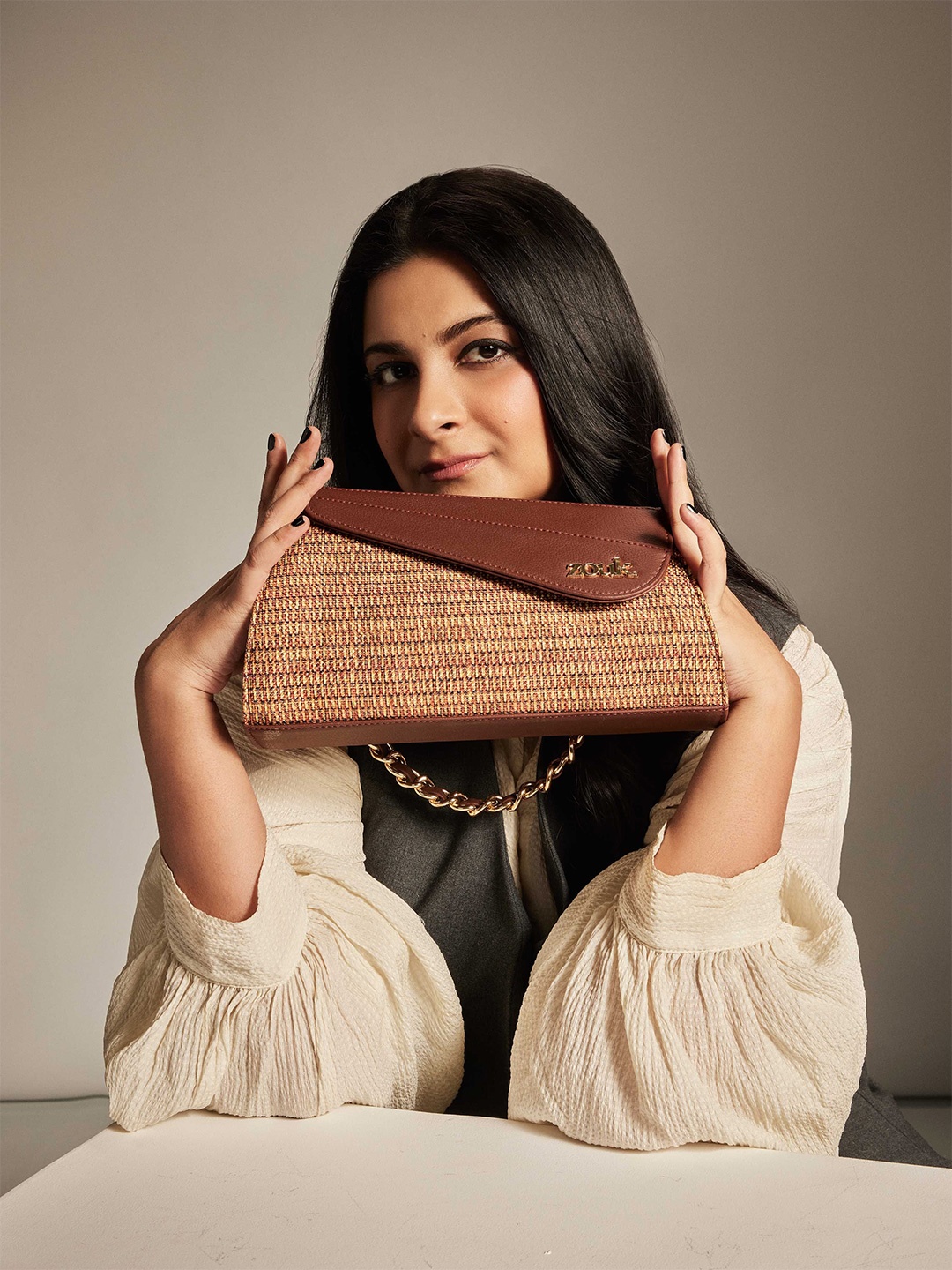 

ZOUK Printed Structured Sling Bag with Tasselled, Gold