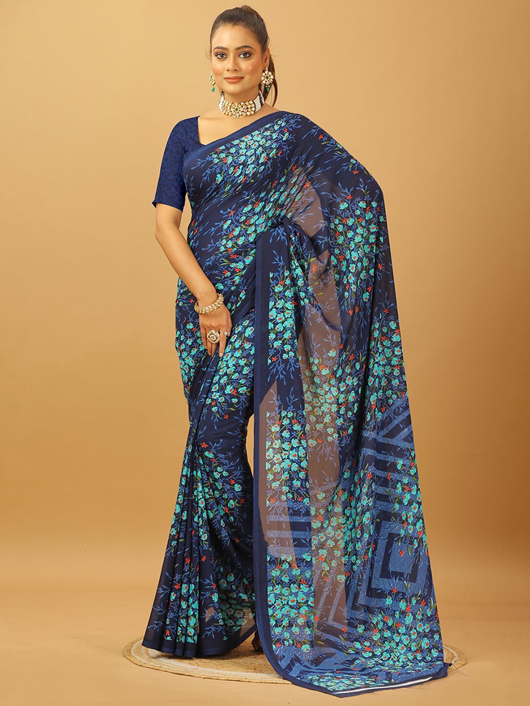

VIRENDRA TEXTILES Floral Pure Georgette Saree, Blue