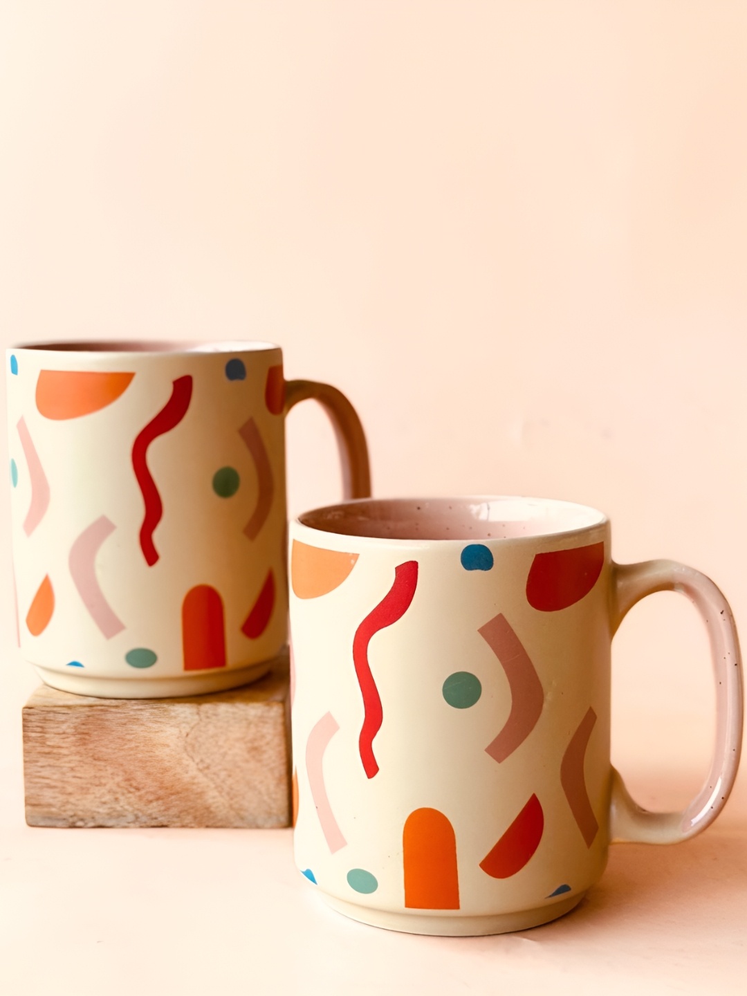 

NURTURE INDIA Beige & Red 2 Pieces Printed Ceramic Matte Mugs 400ml