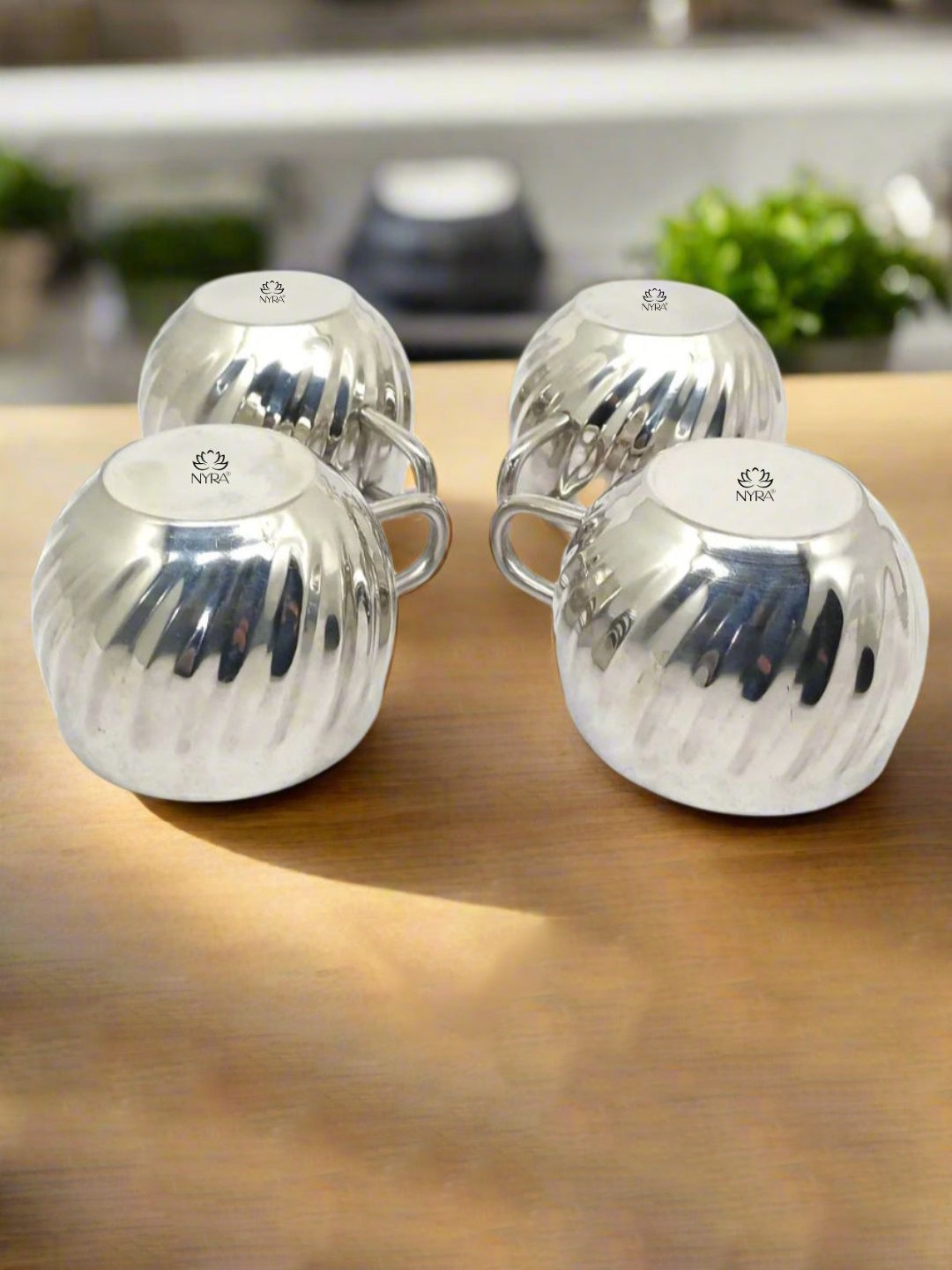 

Nyra Kitchenware Steel 4 Pieces Textured Stainless Steel Glossy Cups