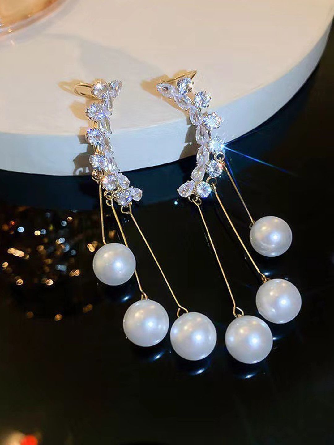 

FIMBUL Korean Gold-Plated American Diamond Studded Contemporary Ear Cuff Earrings