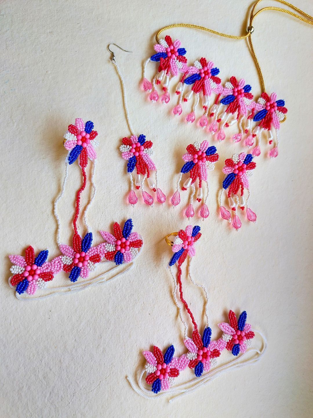 

Sangria Floral Beaded Boho Tasseled Bridal Jewellery Set With Maang Tika, Pink