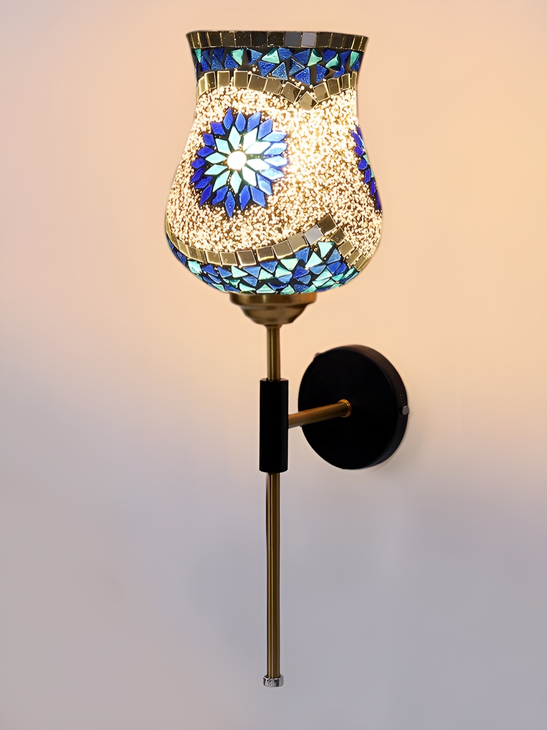 

Devansh White & Gold-Toned Metal Traditional Abstract Shaped Shaped Wall Lamp