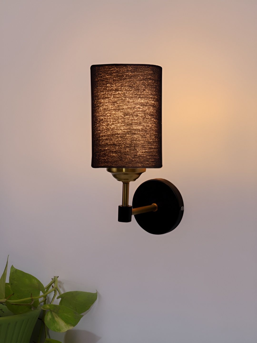 

Devansh Black Metal Traditional Cylinder Shaped Wall Lamp
