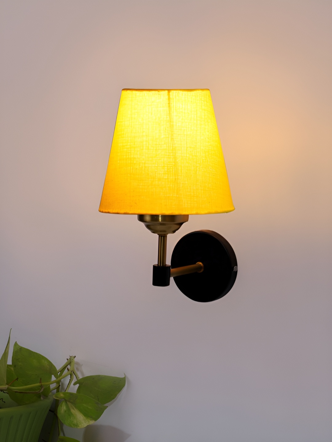 

Devansh Yellow Metal Traditional Wall Lamp